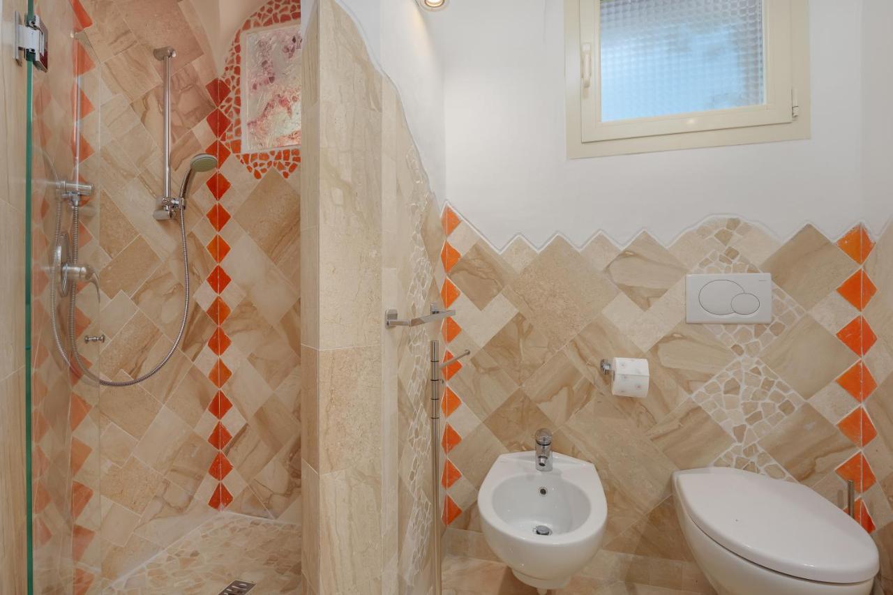 Villetta D'Arancia - Sherdenia Luxury Apartments มาริเนลลา ภายนอก รูปภาพ