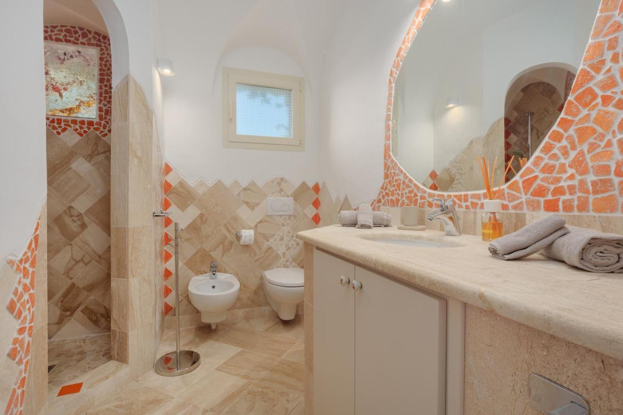 Villetta D'Arancia - Sherdenia Luxury Apartments มาริเนลลา ภายนอก รูปภาพ